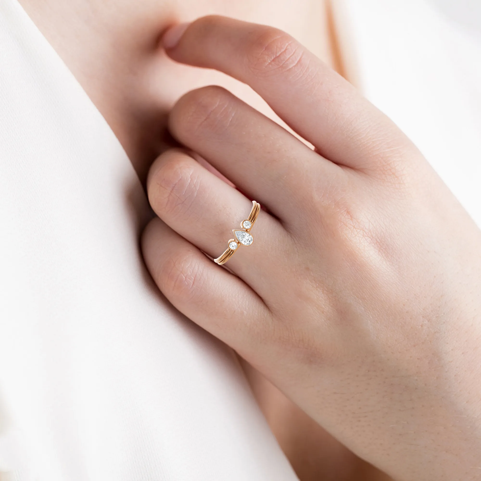 1/3 ctw Pear-Shaped with Round Three Stone Lab Grown Diamond Ring