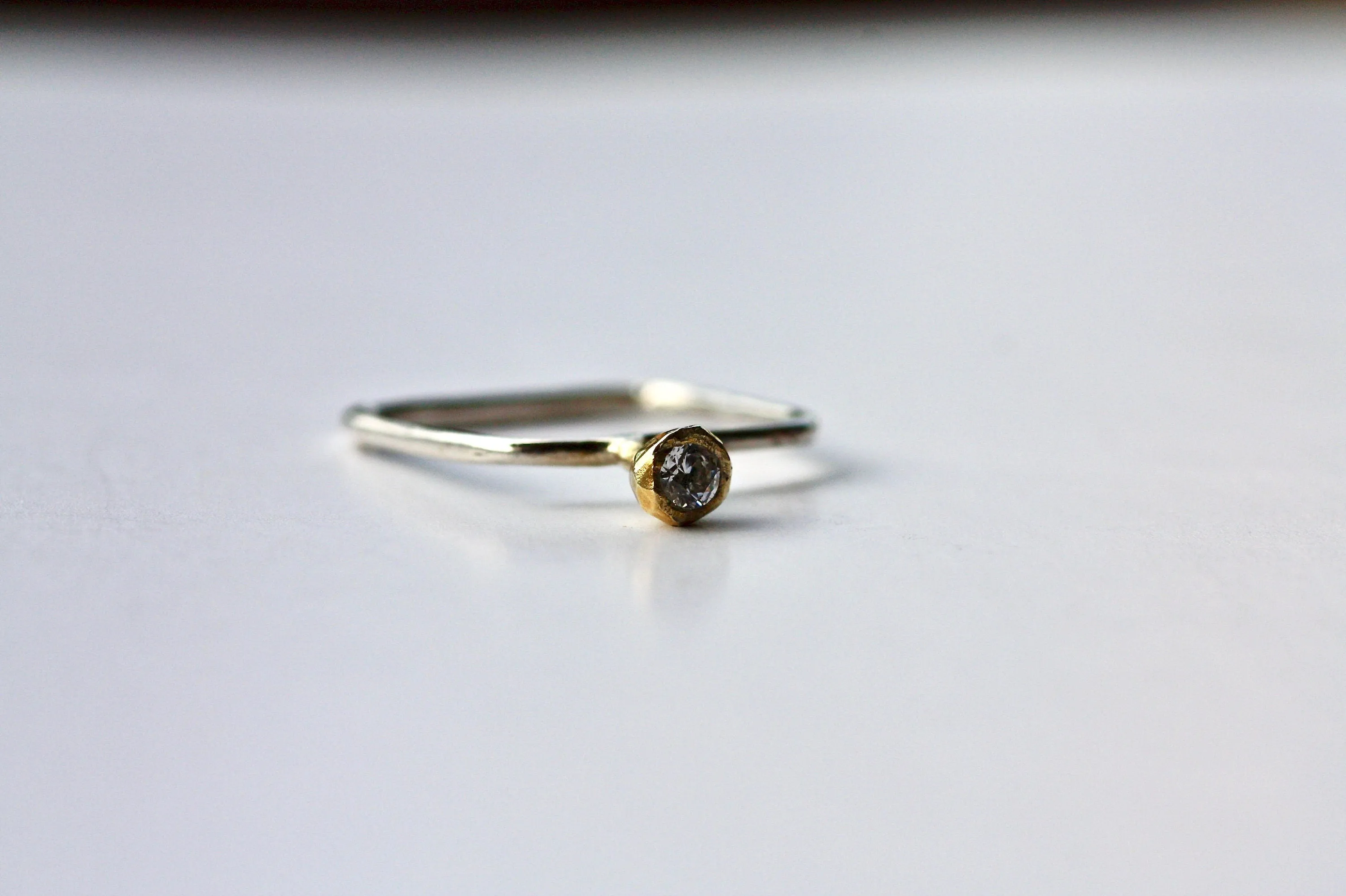 Dainty gold K18 engagement ring