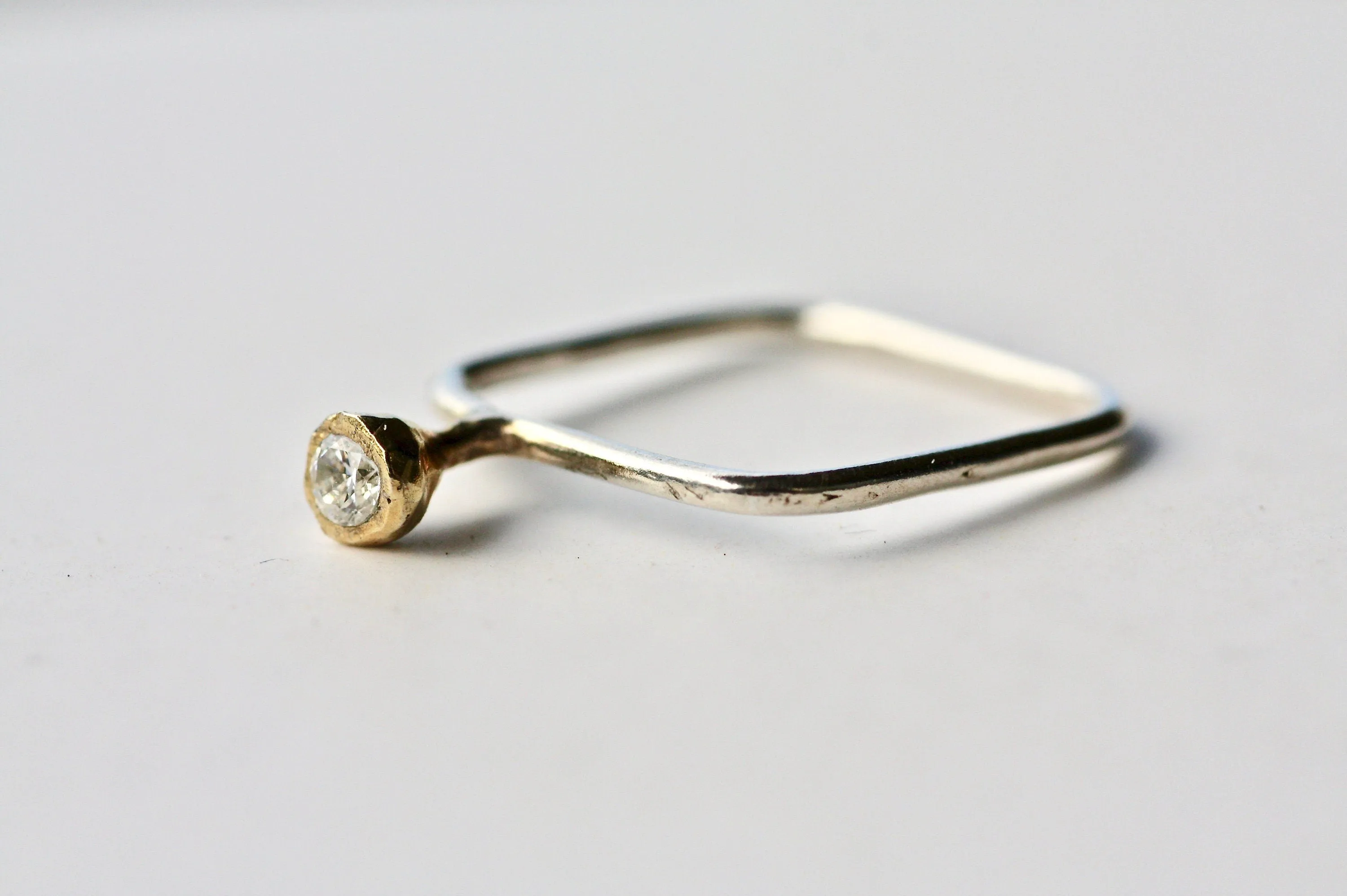 Dainty gold K18 engagement ring